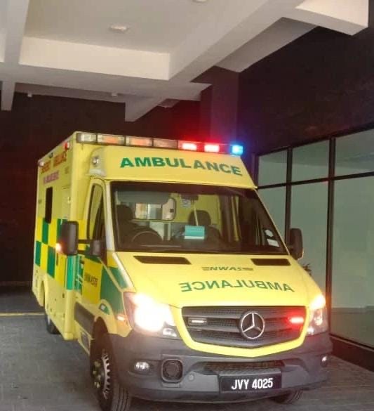 NWAS Mercedes emergency ambulance with lights on